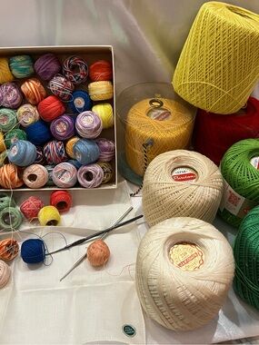 Lot of crochet threats mix of new and used. 7 large and 67 small. Mixed colors